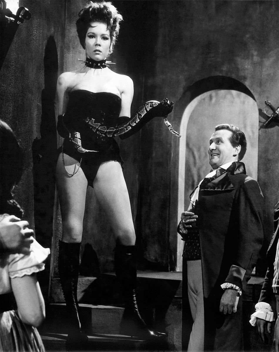 Diana-Rigg-Patrick-Macnee-production-still-from-The-Avengers-season-4-episode-21-“A-Touch-of-Brimstone”-first-broadcast-February-9-1966-1.jpg